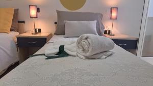 Postel nebo postele na pokoji v ubytování MariMare B&B