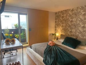 Ένα ή περισσότερα κρεβάτια σε δωμάτιο στο Gloria's Design House