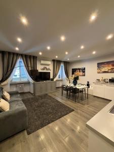 a large living room with a couch and a table at Casa Florian in Turin