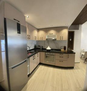 Kuchyň nebo kuchyňský kout v ubytování Appartement vue sur Tower Hassan + 10 fotografií