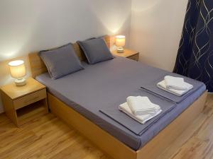 Ένα ή περισσότερα κρεβάτια σε δωμάτιο στο Harmani Beach Apartment 4