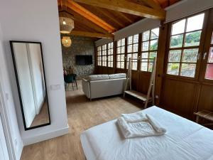 Ένα ή περισσότερα κρεβάτια σε δωμάτιο στο Loben Casona del Deva