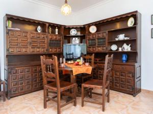 a dining room with a table and chairs at Holiday Home Omega by Interhome in L'Ametlla de Mar