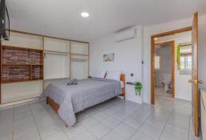 Ένα ή περισσότερα κρεβάτια σε δωμάτιο στο Dream Seaview Loft