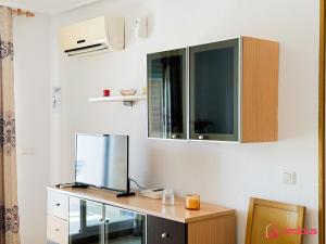 TV a/nebo společenská místnost v ubytování Paísaje Marino
