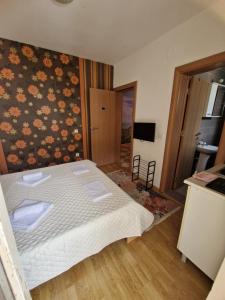 Postel nebo postele na pokoji v ubytování Guest House Damjana