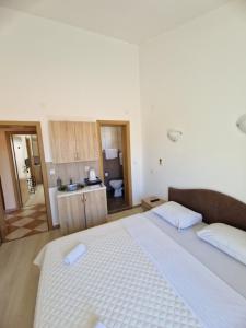 Postel nebo postele na pokoji v ubytování Guest House Damjana