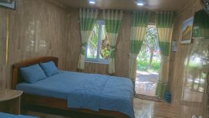 Katil atau katil-katil dalam bilik di Biển Ngọc Homstay +69 gambar