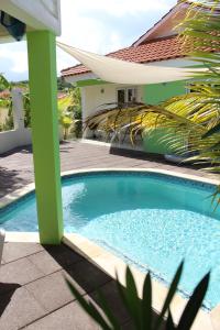 Piscina di CAS IGUANA - Curacao - Villapark Fontein - Ferienhaus mit Pool o nelle vicinanze