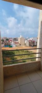 a view of a city from a window at Nour 2 in Oued Laou