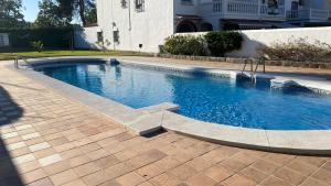 Bazén v ubytování Espectacular Loft con piscina Comunitaria junto al mar Málaga nebo v jeho okolí + 14 fotografií