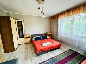 Posteľ alebo postele v izbe v ubytovaní Domek nad Potokiem