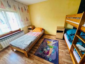Posteľ alebo postele v izbe v ubytovaní Domek nad Potokiem