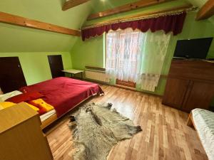 Posteľ alebo postele v izbe v ubytovaní Domek nad Potokiem