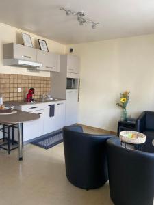 Η κουζίνα ή μικρή κουζίνα στο Confortable et agréable T1 n 2