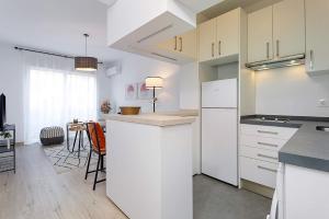 Kuchyňa alebo kuchynka v ubytovaní Genteel Home Santa Marta