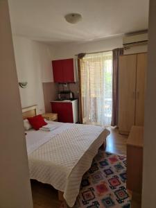 Postel nebo postele na pokoji v ubytování Guest House Damjana