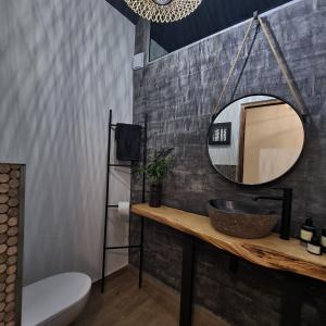 a bathroom with a sink and a mirror at What’s behind the green door! in Cape Town +37 photos