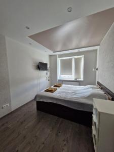 Postel nebo postele na pokoji v ubytování Tallinna mnt 15 Apartament