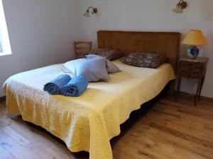 Postel nebo postele na pokoji v ubytování La maison de Félix