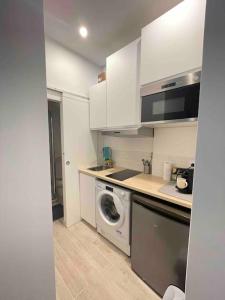 Køkken eller tekøkken på Charming studio, Paris 15 - Parc des expositions + 2 billeder