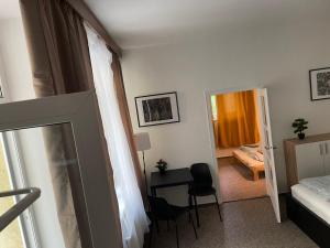 Postel nebo postele na pokoji v ubytování Black Style ROOMS Moravske namesti