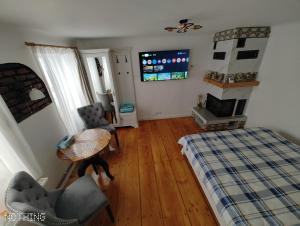 Postel nebo postele na pokoji v ubytování Studio Catalin