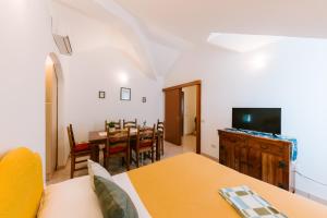TV a/nebo společenská místnost v ubytování Tramonti Resort