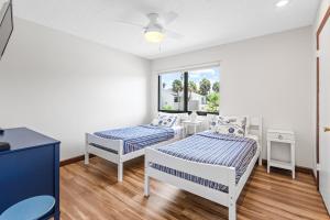 Ένα ή περισσότερα κρεβάτια σε δωμάτιο στο Afterdune Delights +30 φωτογραφίες