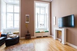 TV a/nebo společenská místnost v ubytování Style&Art Apartment