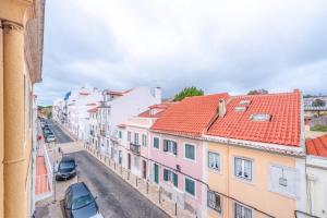 a view of a city street with buildings at GuestReady - Sunshine Belém in Lisbon