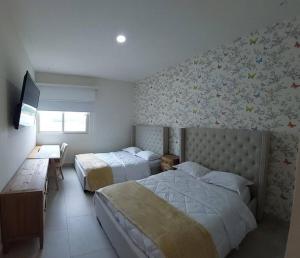 Postel nebo postele na pokoji v ubytování Playa Escondida y el Caribe Panameño te Esperan + 19 fotografií