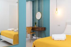 Ένα ή περισσότερα κρεβάτια σε δωμάτιο στο Vatican Lovely Nights-Luxury Rooms