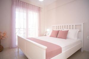 Postel nebo postele na pokoji v ubytování Cozy Home + 23 fotografií
