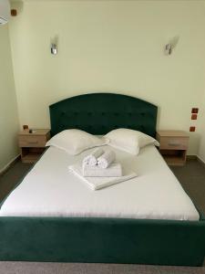 Postel nebo postele na pokoji v ubytování Vila Anir