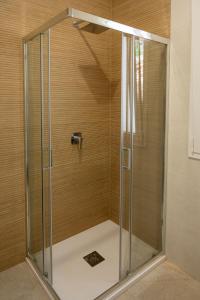 a shower with a glass door in a bathroom at A CASA DI CRISTINA in Lampedusa