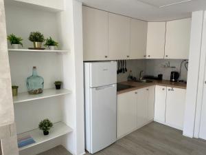 Kuchnia lub aneks kuchenny w obiekcie Przytulny Apartament 100m od plaży