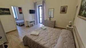 A bed or beds in a room at B&B IL CEDRO