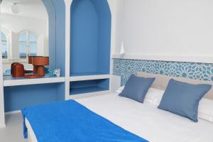 Letto o letti in una camera di La Maison De La Ville