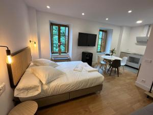 Postel nebo postele na pokoji v ubytování Loben Casona del Deva