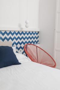 Letto o letti in una camera di La Maison De La Ville