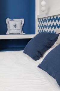 Letto o letti in una camera di La Maison De La Ville