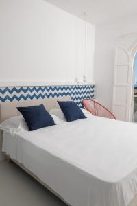 Letto o letti in una camera di La Maison De La Ville