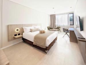Botanico Hotel y Spa客房内的一张或多张床位