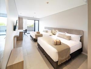 Botanico Hotel y Spa客房内的一张或多张床位
