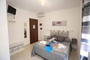 A television and/or entertainment centre at La Corte Dei Naviganti