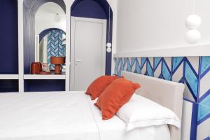 Letto o letti in una camera di La Maison De La Ville