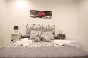 A bed or beds in a room at La Corte Dei Naviganti