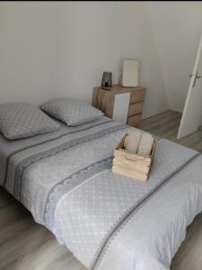 Katil atau katil-katil dalam bilik di Maison Cosy Calme Central Bus Lac Kir
