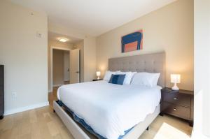 Ένα ή περισσότερα κρεβάτια σε δωμάτιο στο Luxury Apt with Pool